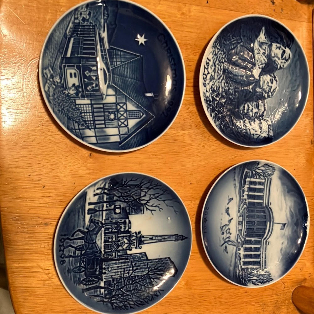 Older from 1992 - 2001 set of 4 porcelain commemorative 5” plates all hand